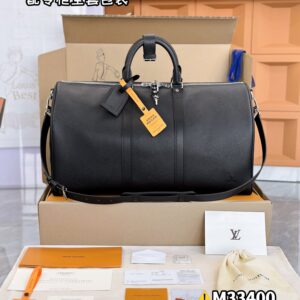 Keepall Bandouliere 50 Travel Bag M33400 Premium Genuine Leather Crossgrain Black Travel Bag [with full boutique packaging], measuring 50x29x23 cm, is made of extremely supple Taiga leather, with a canvas lining and metal hardware.
