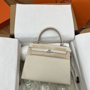 Hermès Kelly 25cm in Milkshake White, Epsom leather, with silver hardware.
