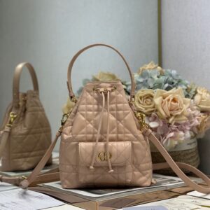Small Dior Caro Bucket Bag (Pink) – This Dior Caro bucket bag is crafted from pink lambskin. Dimensions: 20 x 24 x 9 cm