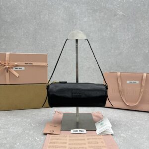 Miu M* Mini cylindrical bag, lambskin Dimensions: Length 22 x Width 10 x Height 9 cm
